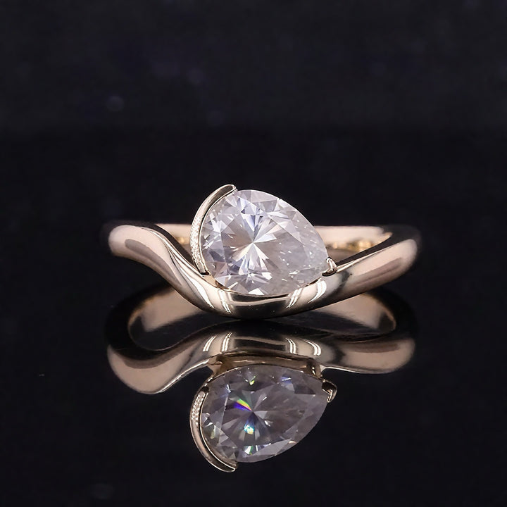 6x8mm, 1.25ct Pear Cut with Moissanite Curved Ring in 14K/18K Yellow Gold