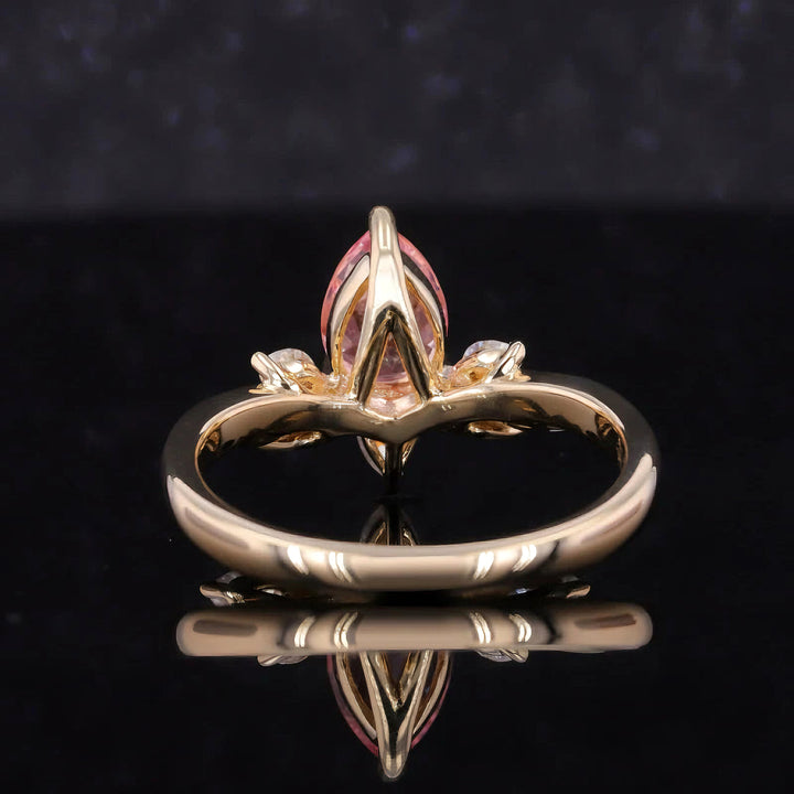 5x7mm, 0.85ct Pear Lab-Grown Pink Sapphire Ring with Marquise Diamond Accents in 14K Yellow Gold