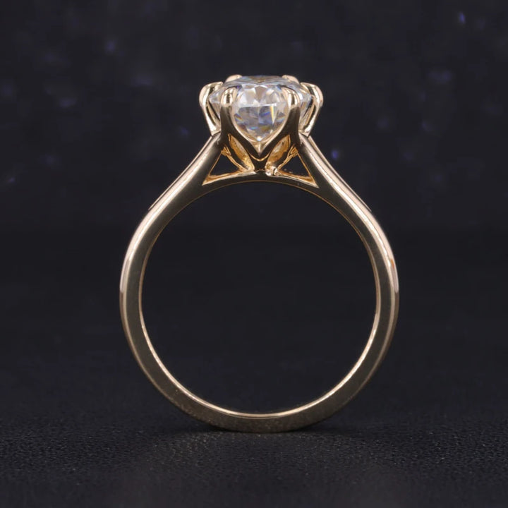 7x10mm Oval Cut Moissanite Ring with Valley Band in Yellow Gold