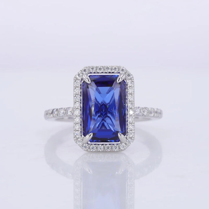7x11mm, 4.90ct Baguette Step Lab-Grown Blue Sapphire with Diamond Halo/Half-Eternity Ring in 18K White Gold