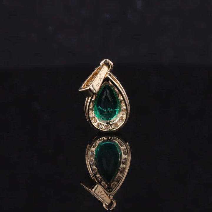 5x7mm, 0.75ct Pear Lab-Grown Zambian Emerald with Diamond Halo Pendant in 14K Yellow Gold