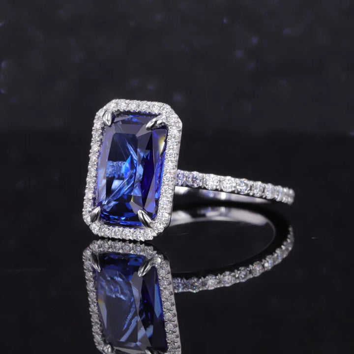 7x11mm, 4.90ct Baguette Step Lab-Grown Blue Sapphire with Diamond Halo/Half-Eternity Ring in 18K White Gold