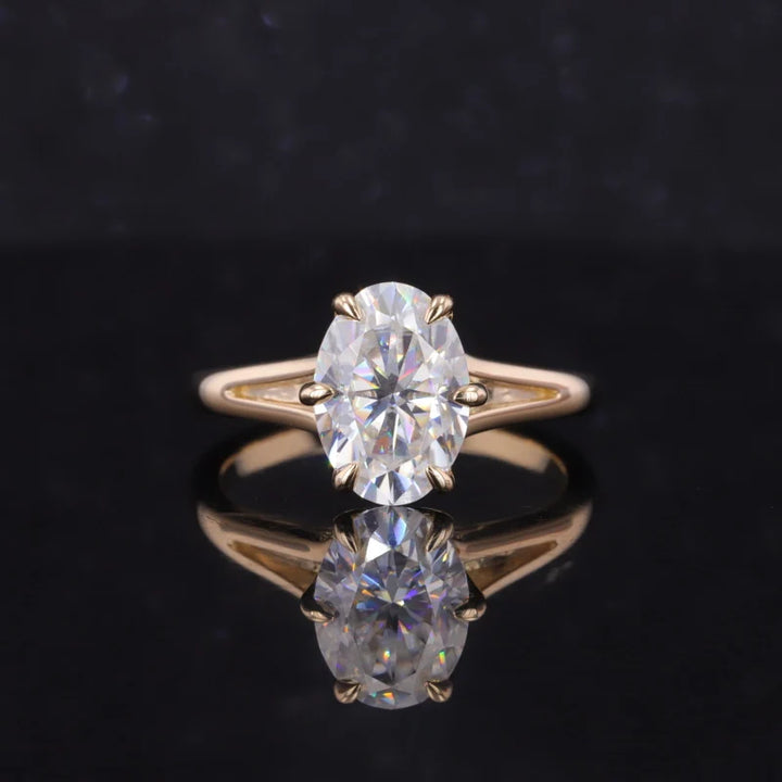 7x10mm Oval Cut Moissanite Ring with Valley Band in Yellow Gold