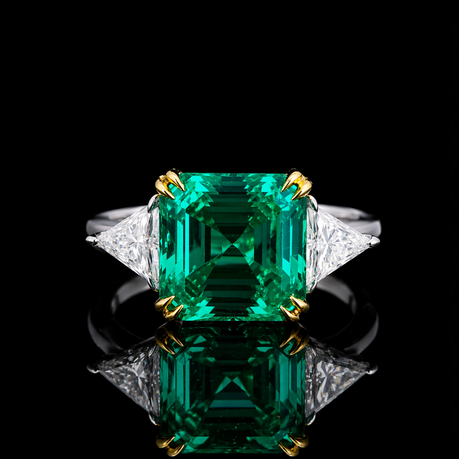 The Facet — Emerald Three-Stone Ring