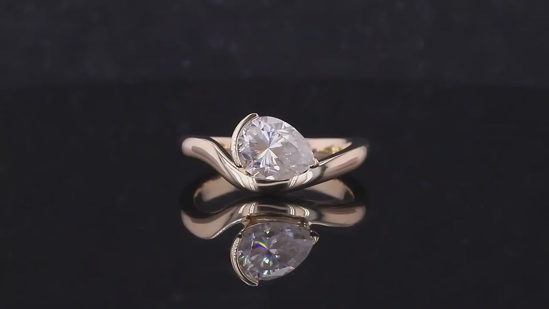 6x8mm, 1.25ct Pear Cut with Moissanite Curved Ring in 14K/18K Yellow Gold
