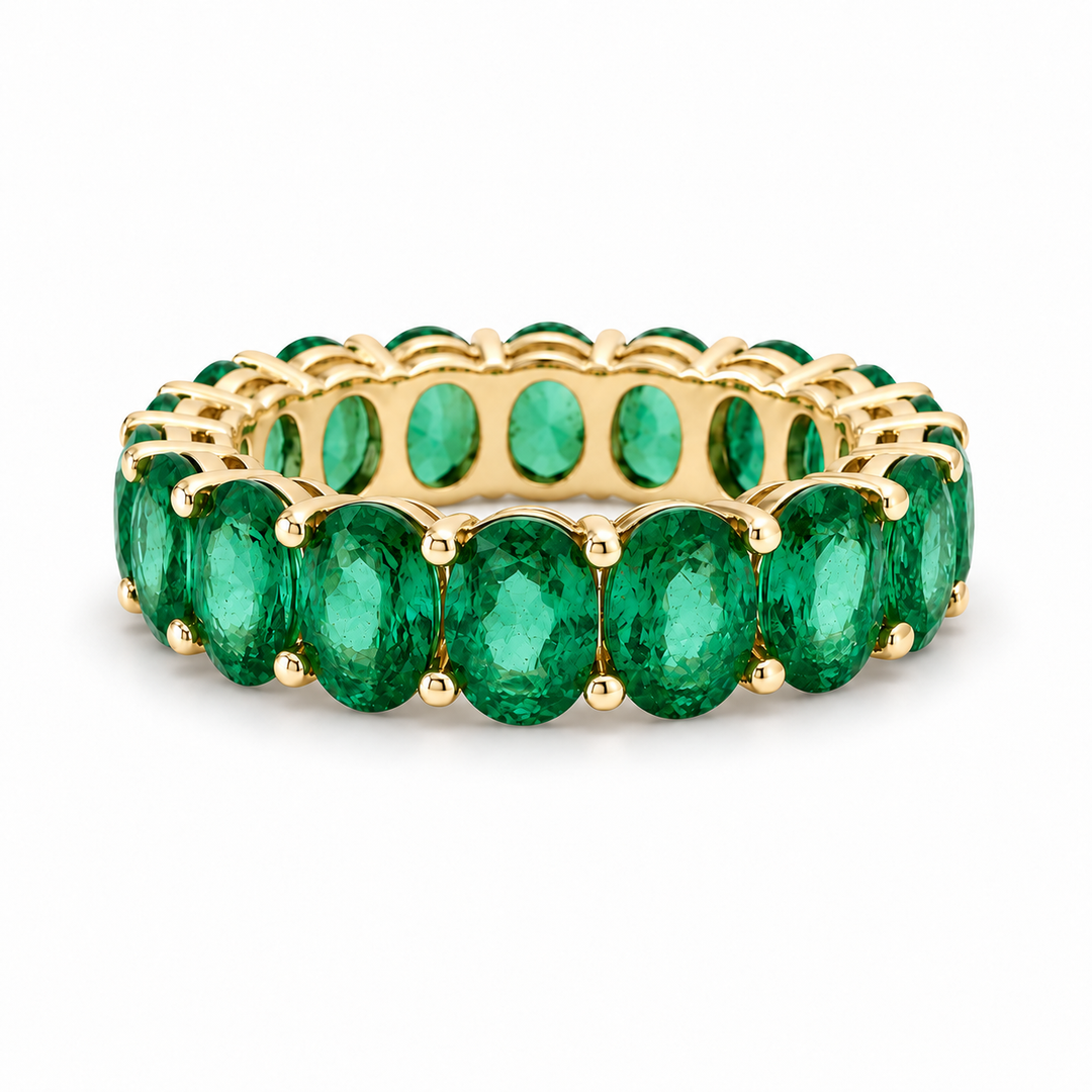 Oval Zambian Emerald Eternity Band Ring (5mm, 4.00ctw) in yellow gold