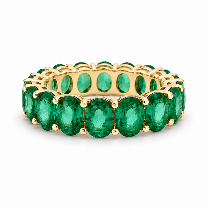 Oval Zambian Emerald Eternity Band Ring (5mm, 4.00ctw) in yellow gold