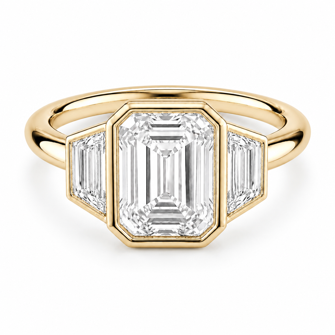 Paragon Trilogy emerald-cut lab diamond three-stone ring in 14K yellow gold, front view on white