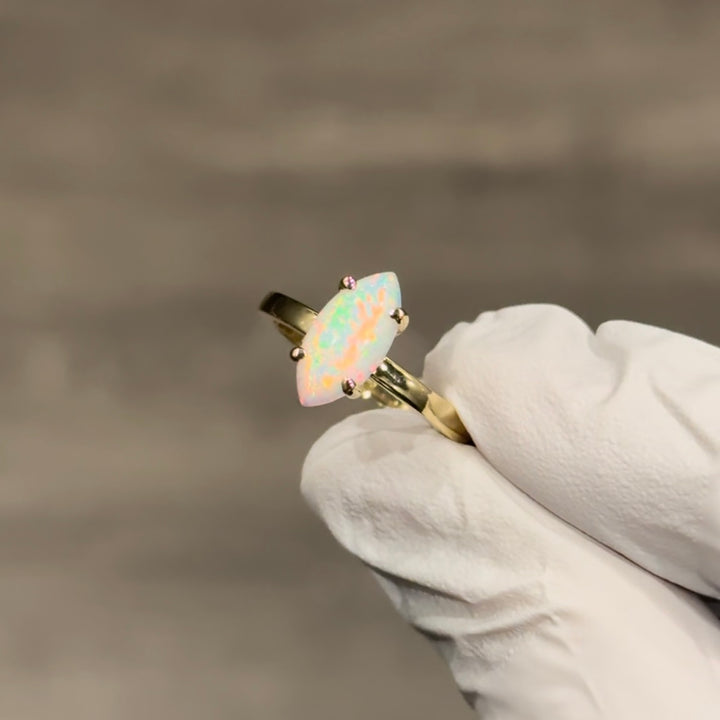 Customized™ 6x12mm, 1.70ct Marquise Cut Opal with Emerald Hidden Halo Ring in Yellow Gold