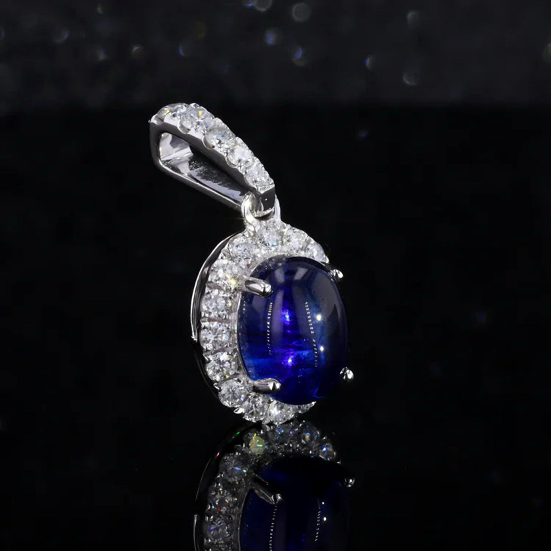 6x8mm, 1.80ct Oval Cabochon Lab-Grown Blue Sapphire with Diamond Halo Pendant in 14K White Gold