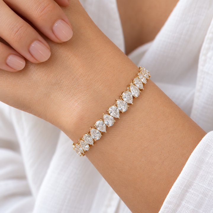 Interlocking Pear Lab Diamond Tennis Bracelet worn on the wrist, shown true to size