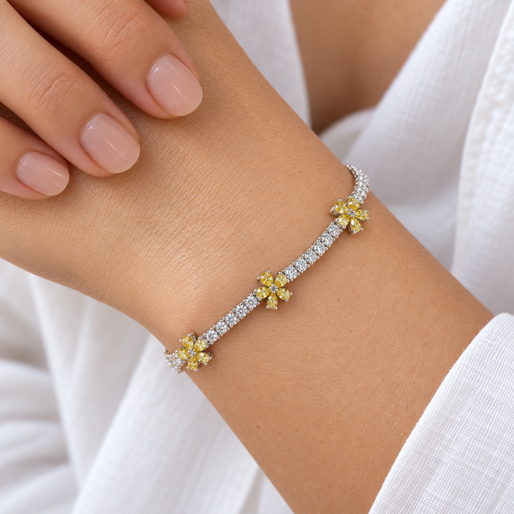 Yellow Flower Lab Diamond Tennis Bracelet worn on the wrist, shown true to size