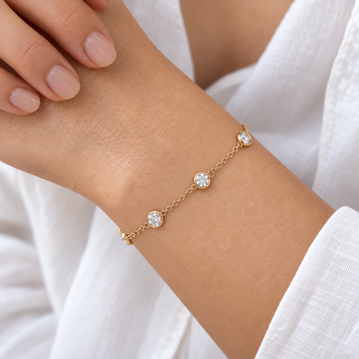Bezel-Set Lab Diamond Station Bracelet worn on the wrist, shown true to size