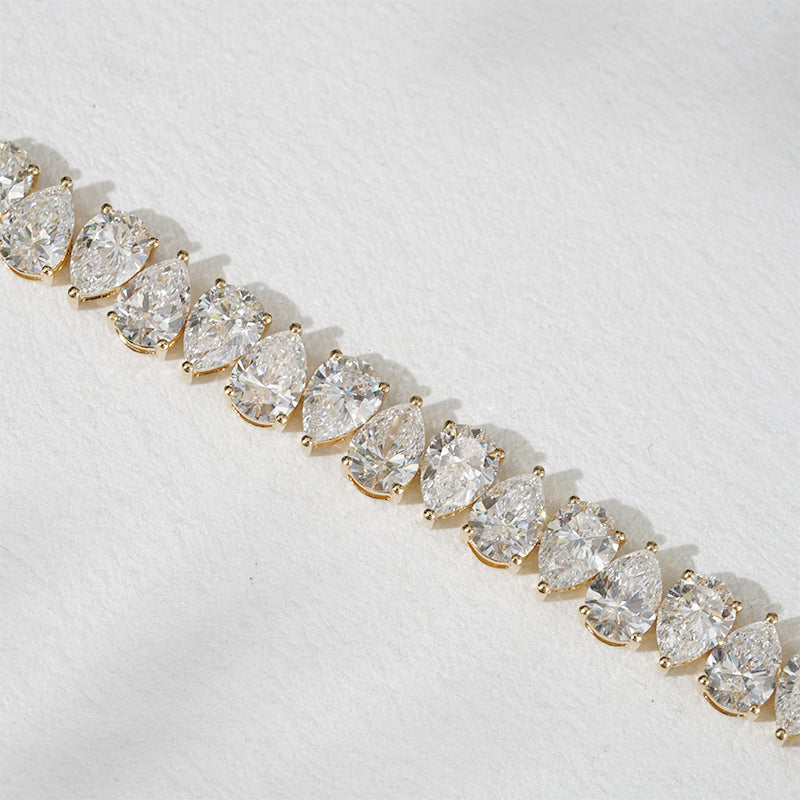 7mm, 22ct Pear Cut Interlocking Diamond Tennis Bracelet in 18K Solid Yellow Gold