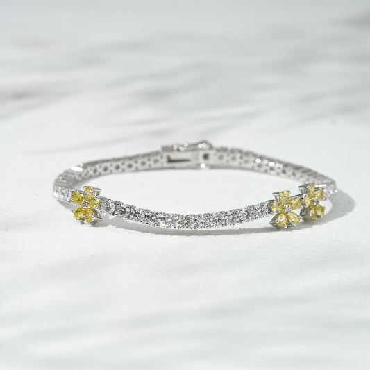 3mm, 7.5ct Round Cut Diamond Tennis Bracelet with Yellow Diamond Flowers in 14K Solid White Gold