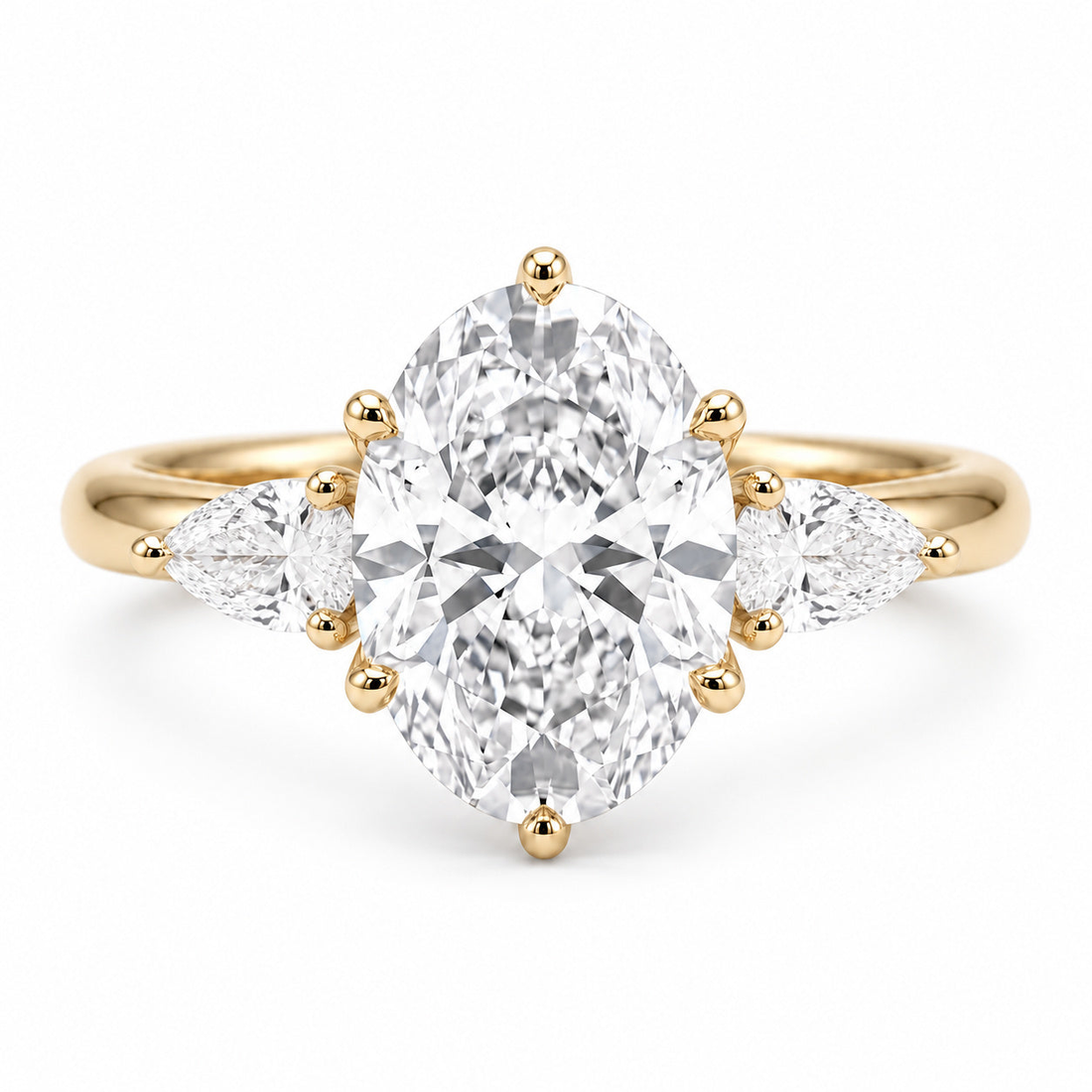 Lotus Lace Trilogy oval and pear lab diamond three-stone ring in 14K yellow gold