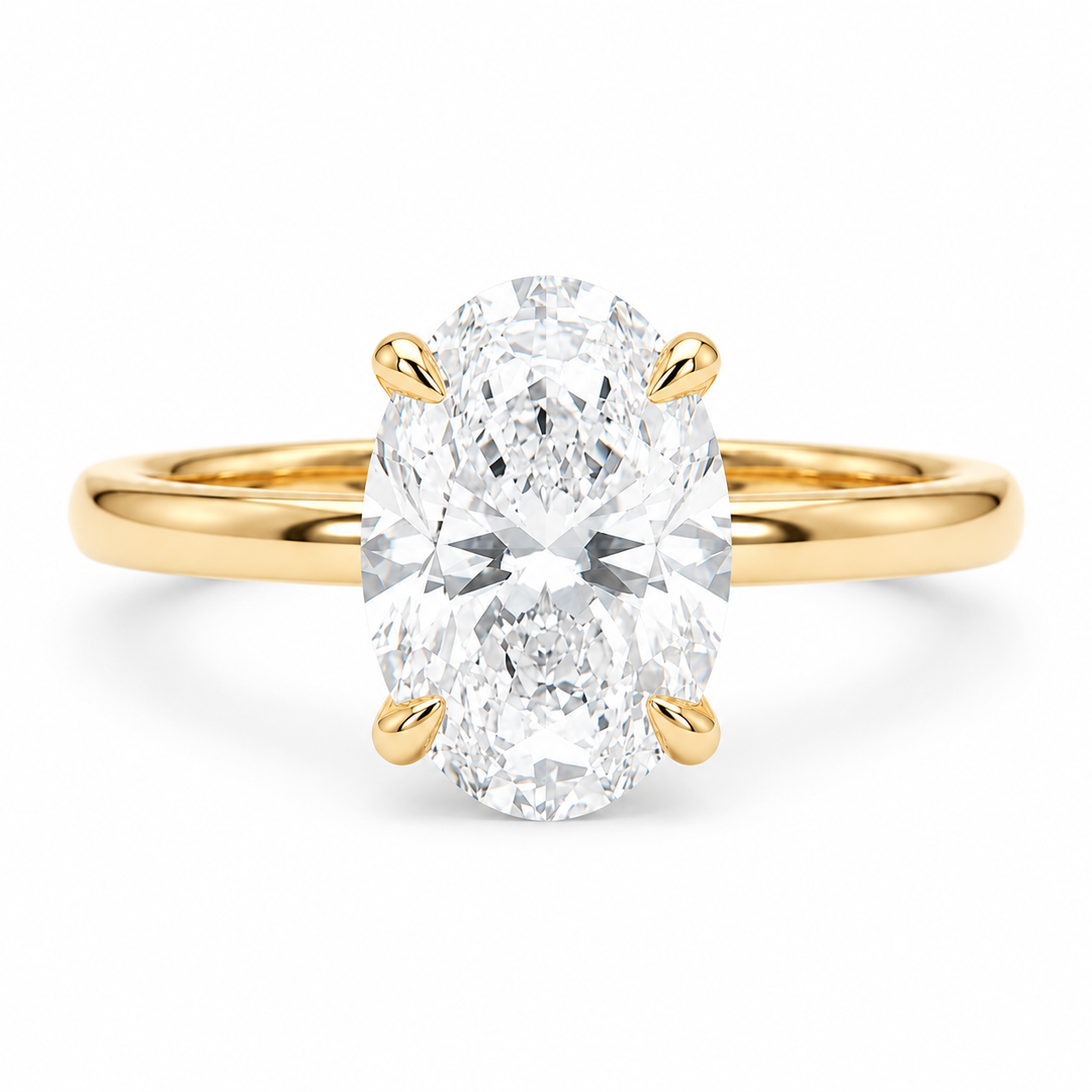 Oval lab diamond engagement ring in 14K yellow gold, front view on white