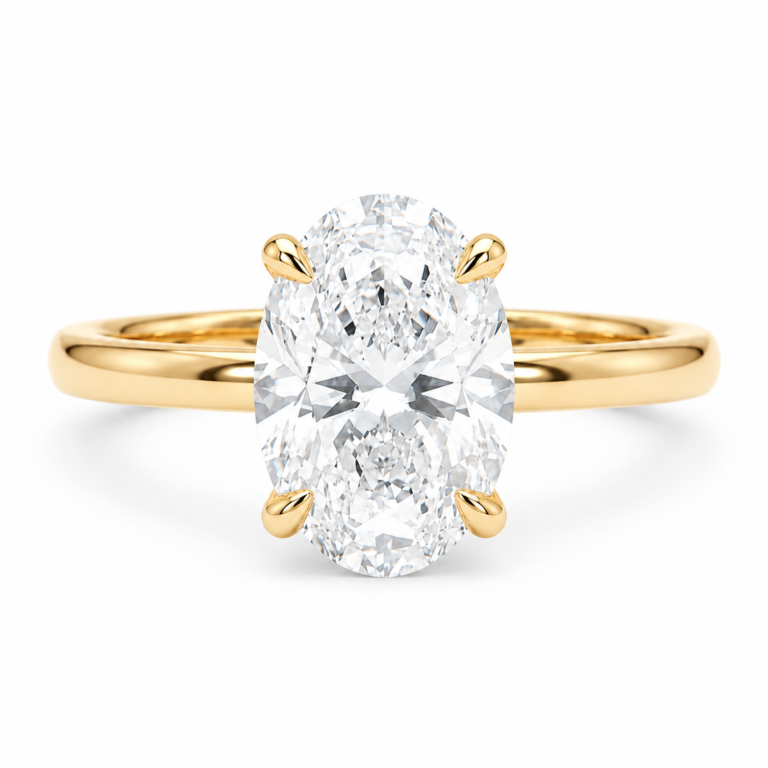 Oval lab diamond engagement ring in 14K yellow gold, front view on white