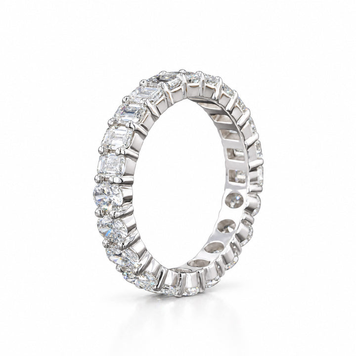 Half Oval & Half Emerald Diamond Eternity Band in 14K white gold, angle view