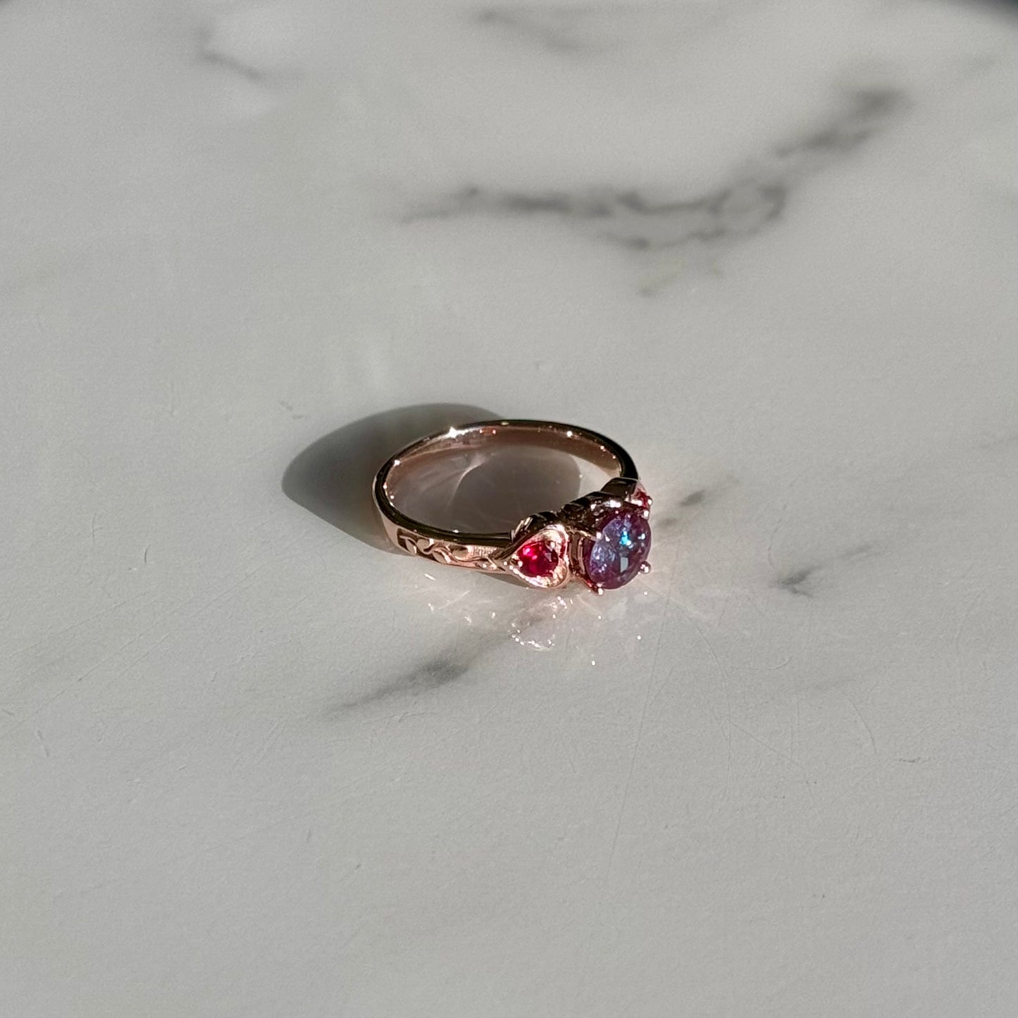 Customized™ 1.00ct Round Alexandrite with Natural Rubies Three-Stone Ring in 10K Solid Rose Gold