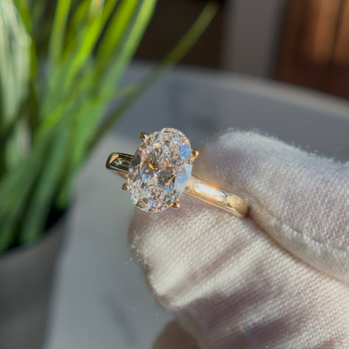 Customized™ 2.20ct Oval Lab-Grown Diamond Solitaire Ring with Hidden Halo and Pavé Cathedral in Yellow Gold