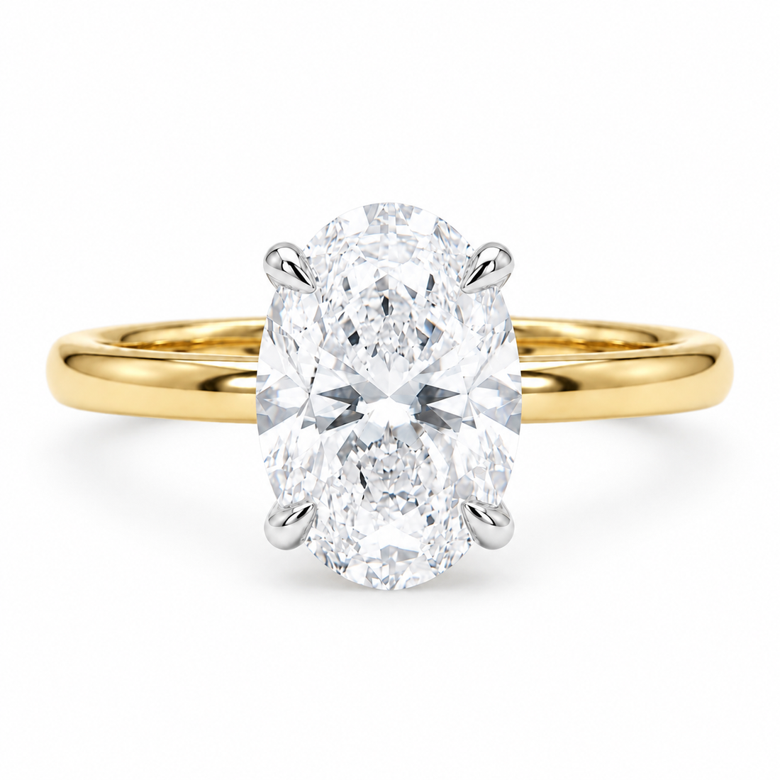 Oval lab diamond engagement ring in two-tone gold, front view on white