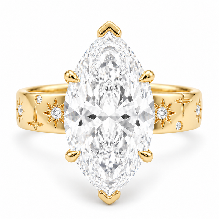 The Starlight marquise lab diamond ring with engraved star band in 14K yellow gold, front view on white