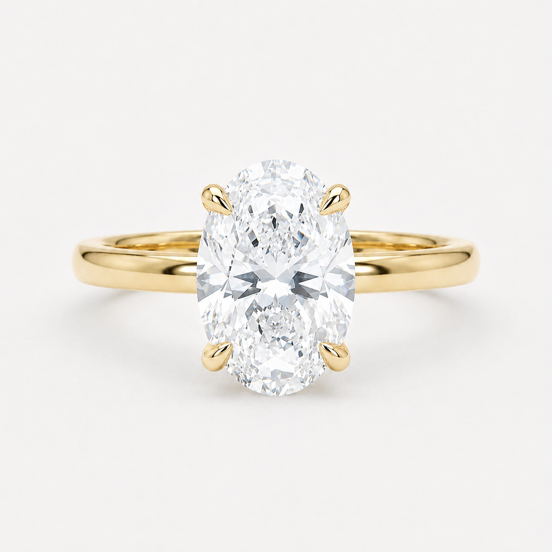 Oval lab diamond engagement ring in 14K yellow gold