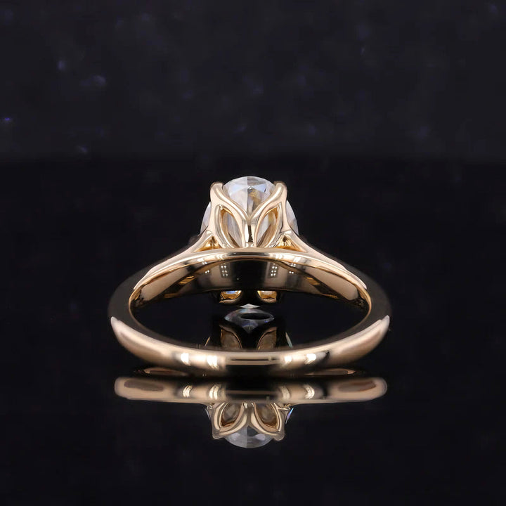7x10mm Oval Cut Moissanite Ring with Valley Band in Yellow Gold