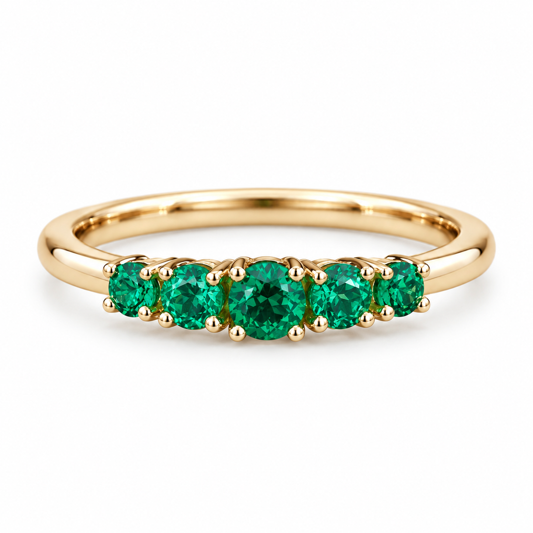 Round lab emerald five-stone ring in 14K yellow gold, front view on white