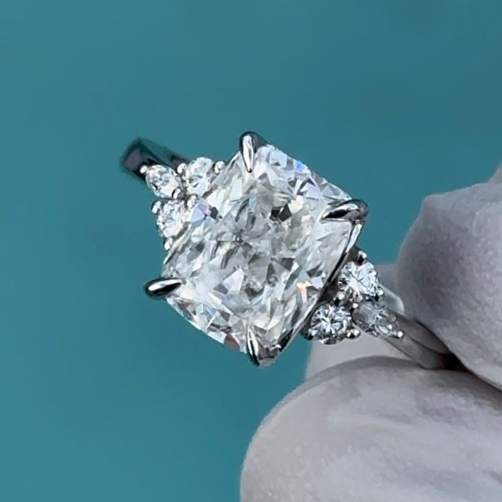 Customized™ 7x9mm, 3.00ct Ice Crushed Cushion Cut Moissanite with Side Accents in White Gold