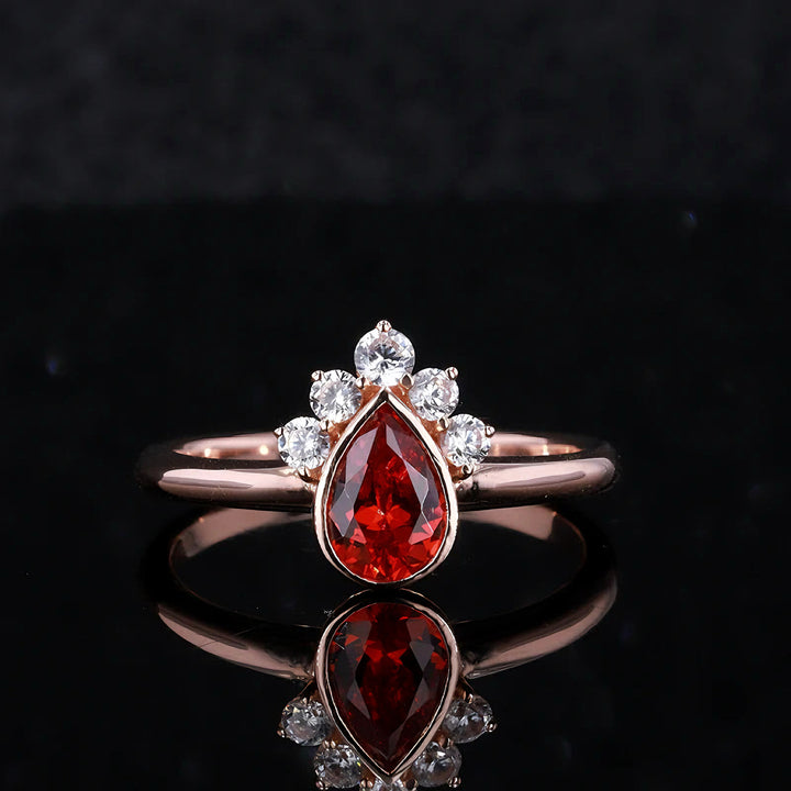 7x10mm, 3.00ct Pear Lab-Grown Red Ruby Ring with Diamond Accents in 14K Rose Gold