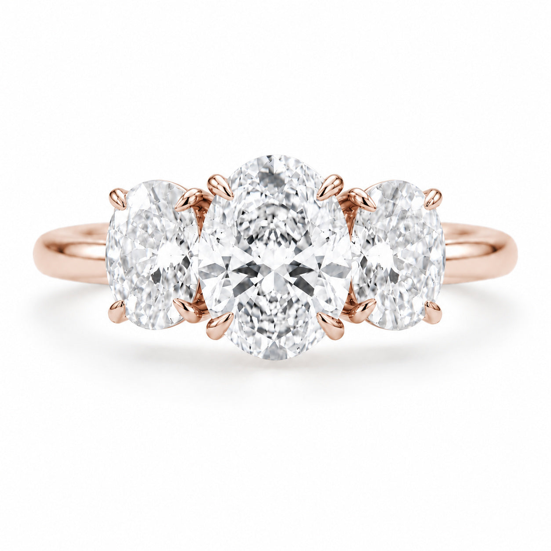 The Étoile oval lab diamond three-stone ring in 14K rose gold