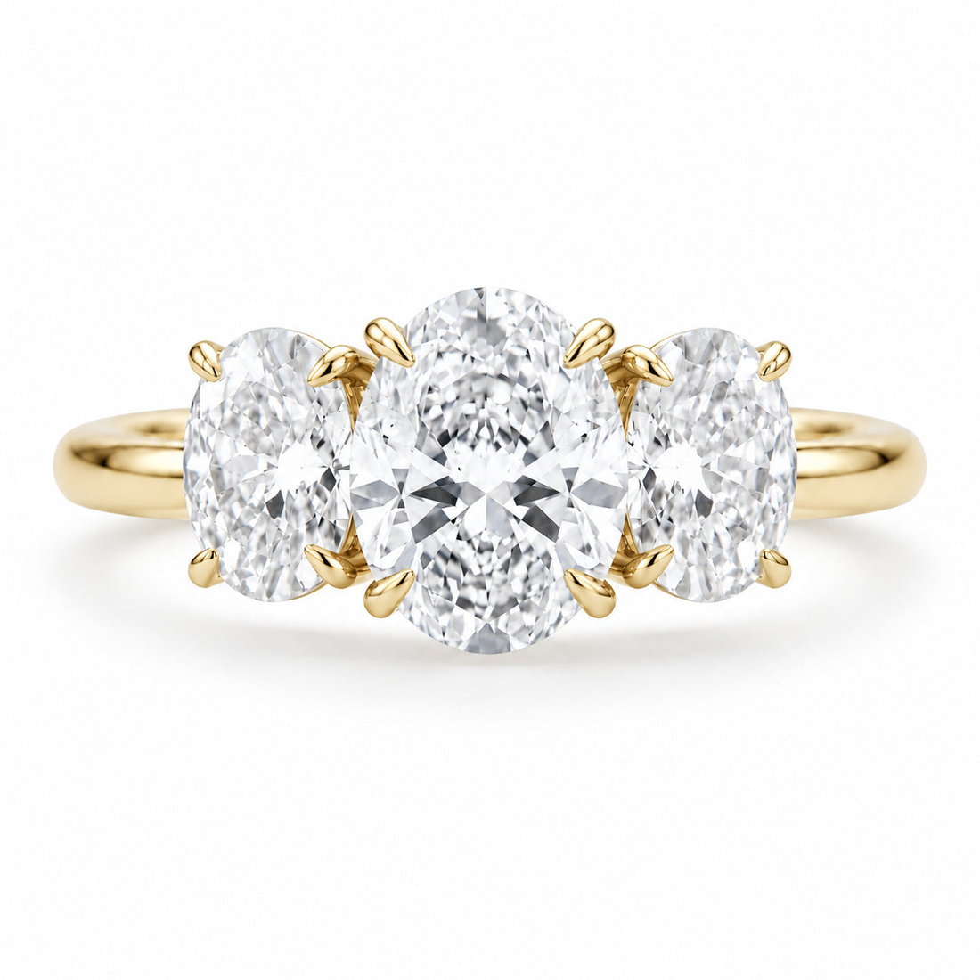 The Étoile oval lab diamond three-stone ring in 14K yellow gold
