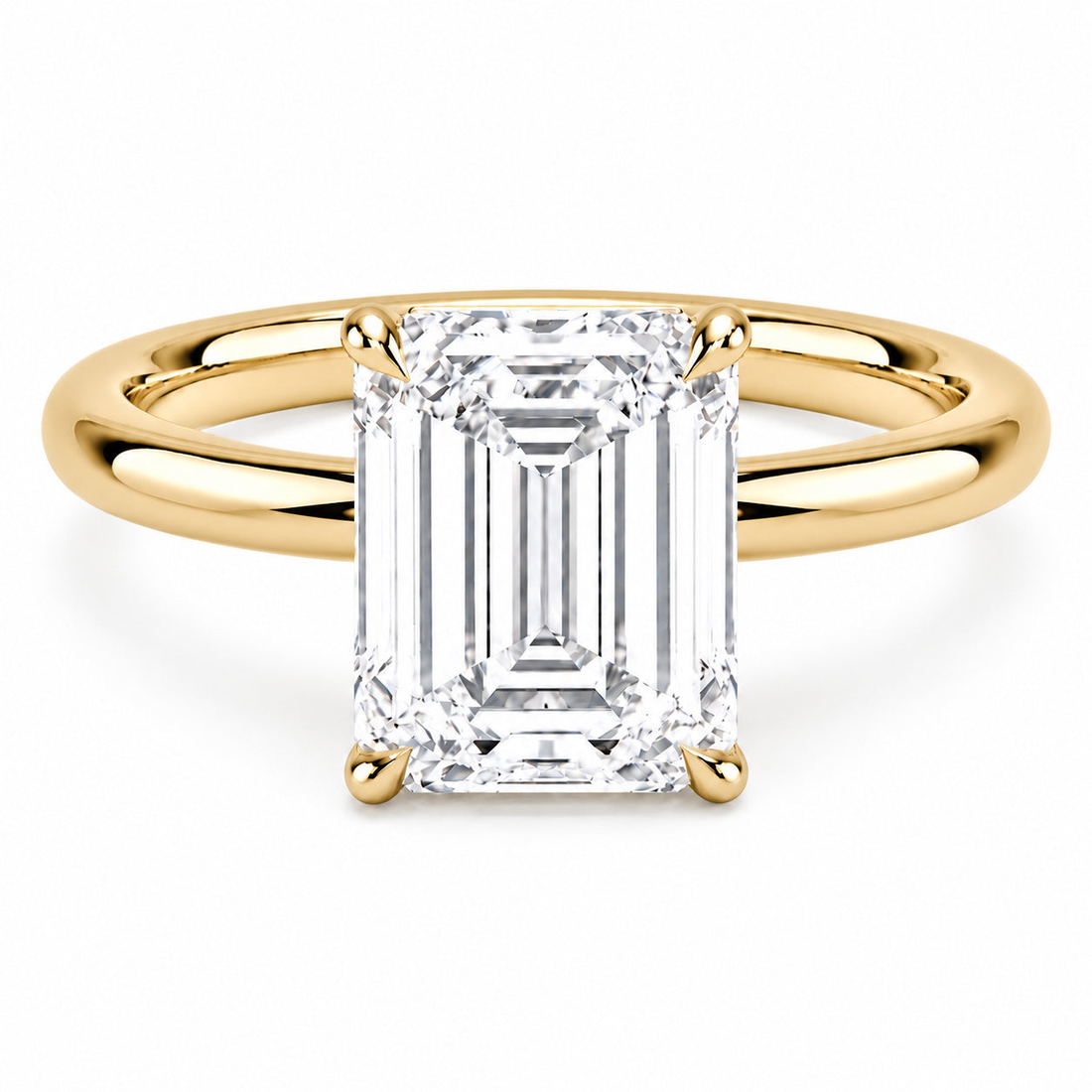 The Flora Four emerald-cut lab diamond solitaire ring in 14K yellow gold
