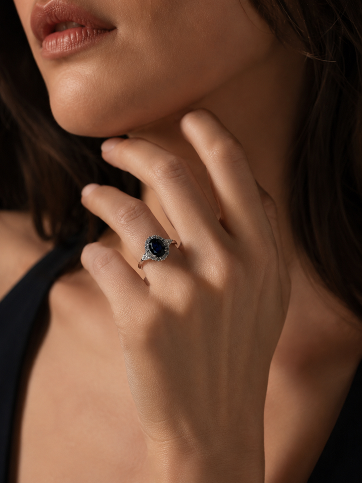 The Modified Diana — Diamond Halo Oval Blue Sapphire Ring