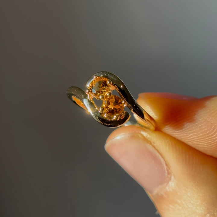 0.70ct "Stretch & Sword" Orange Sapphire Two-Stone Ring in Yellow Gold
