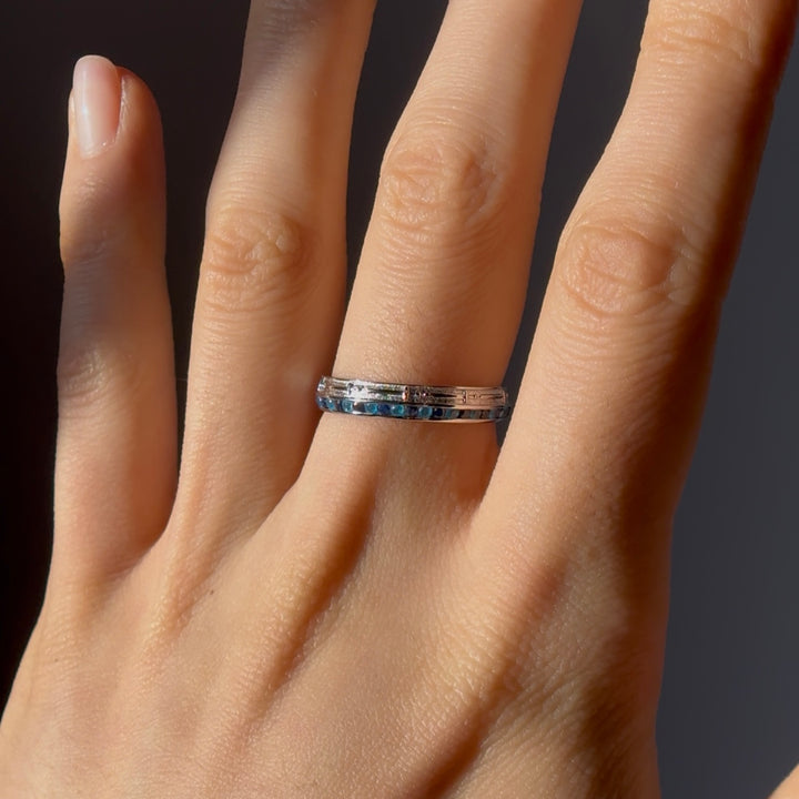 4mm "Stretch & Sword" Sapphire/Paraiba Band Ring in White Gold