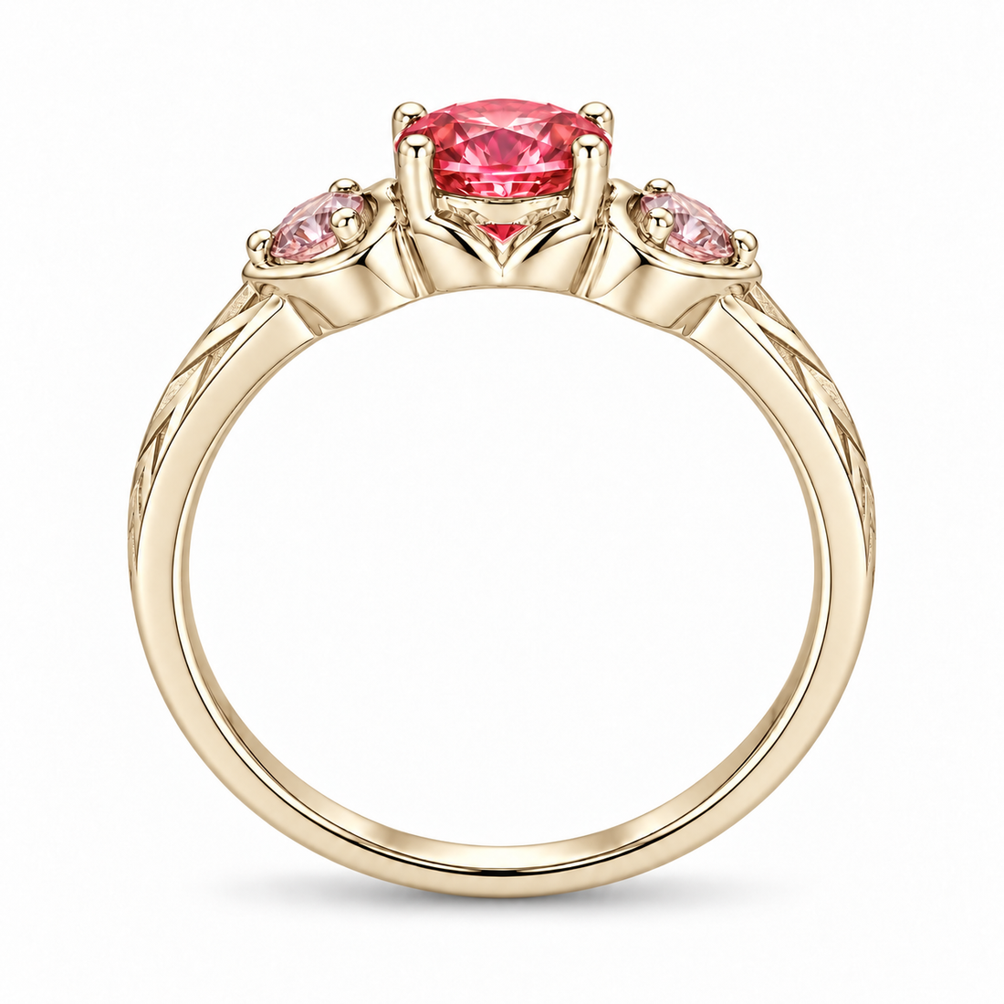 Atoms & Impact pink sapphire three-stone ring in champagne yellow gold, profile view on a clean white background