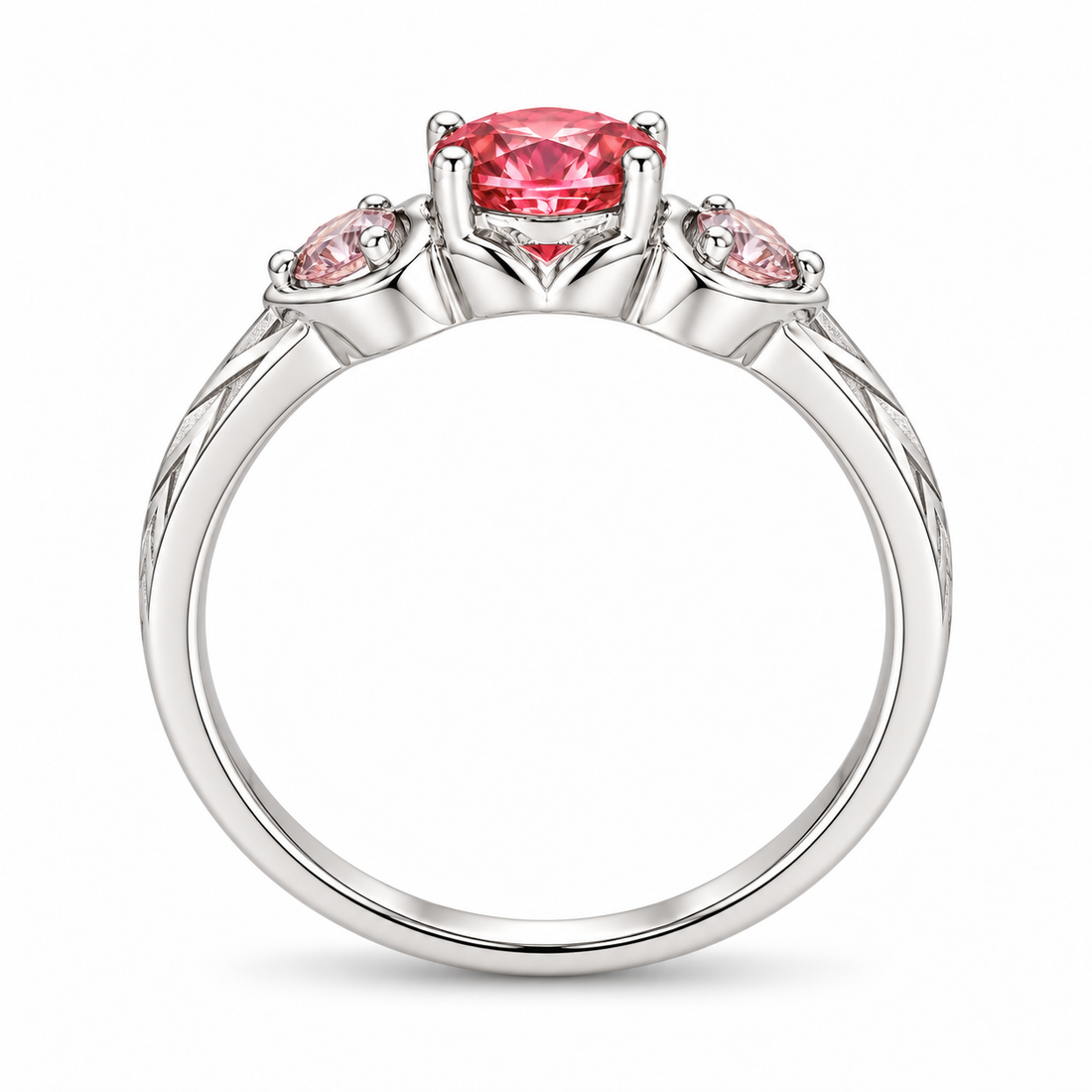 Atoms & Impact pink sapphire three-stone ring in white gold, profile view on a clean white background