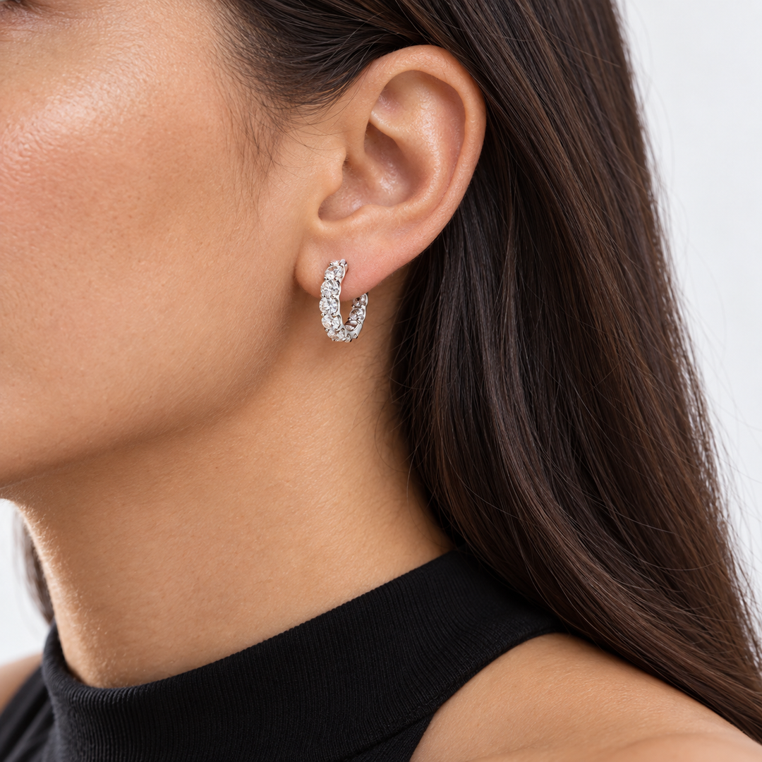 Petite Lab Diamond Huggie Earrings worn on the ear