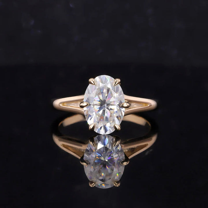 7x10mm Oval Cut Moissanite Ring with Valley Band in Yellow Gold
