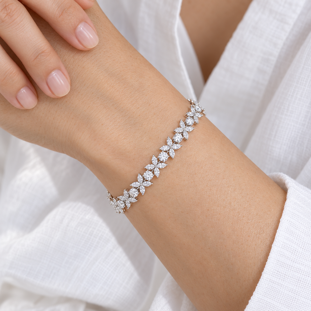 The Jardin Blossom Tennis Bracelet worn on the wrist