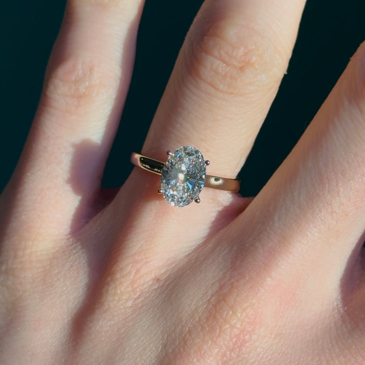 Customized™ 2.20ct Oval Lab-Grown Diamond Solitaire Ring with Hidden Halo and Pavé Cathedral in Yellow Gold