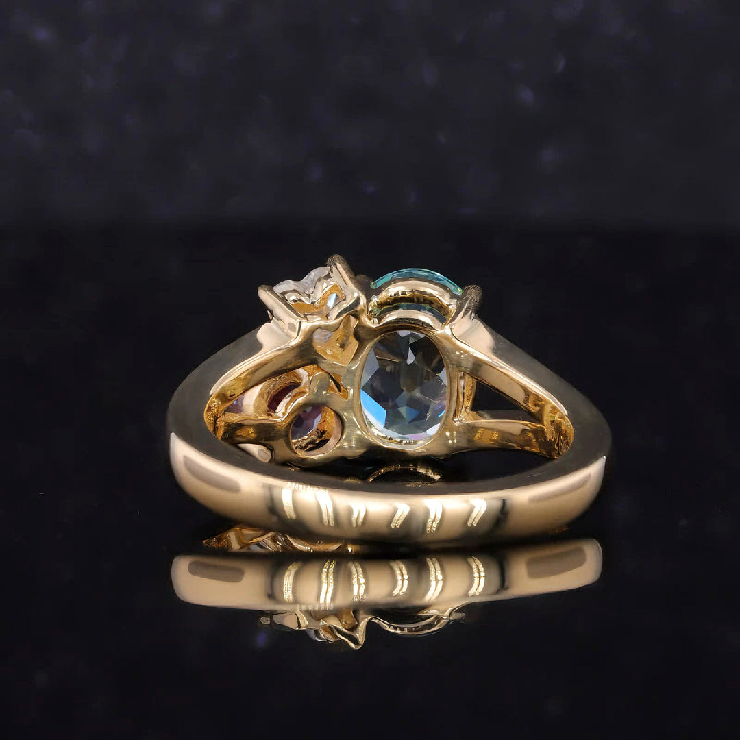 7x9mm Oval Cut Paraiba, 4x4mm Round Cut Alexandrite, 4mm Heart Cut Moissanite Three Stone Toi Et Moi Ring in Solid 18K Yellow Gold