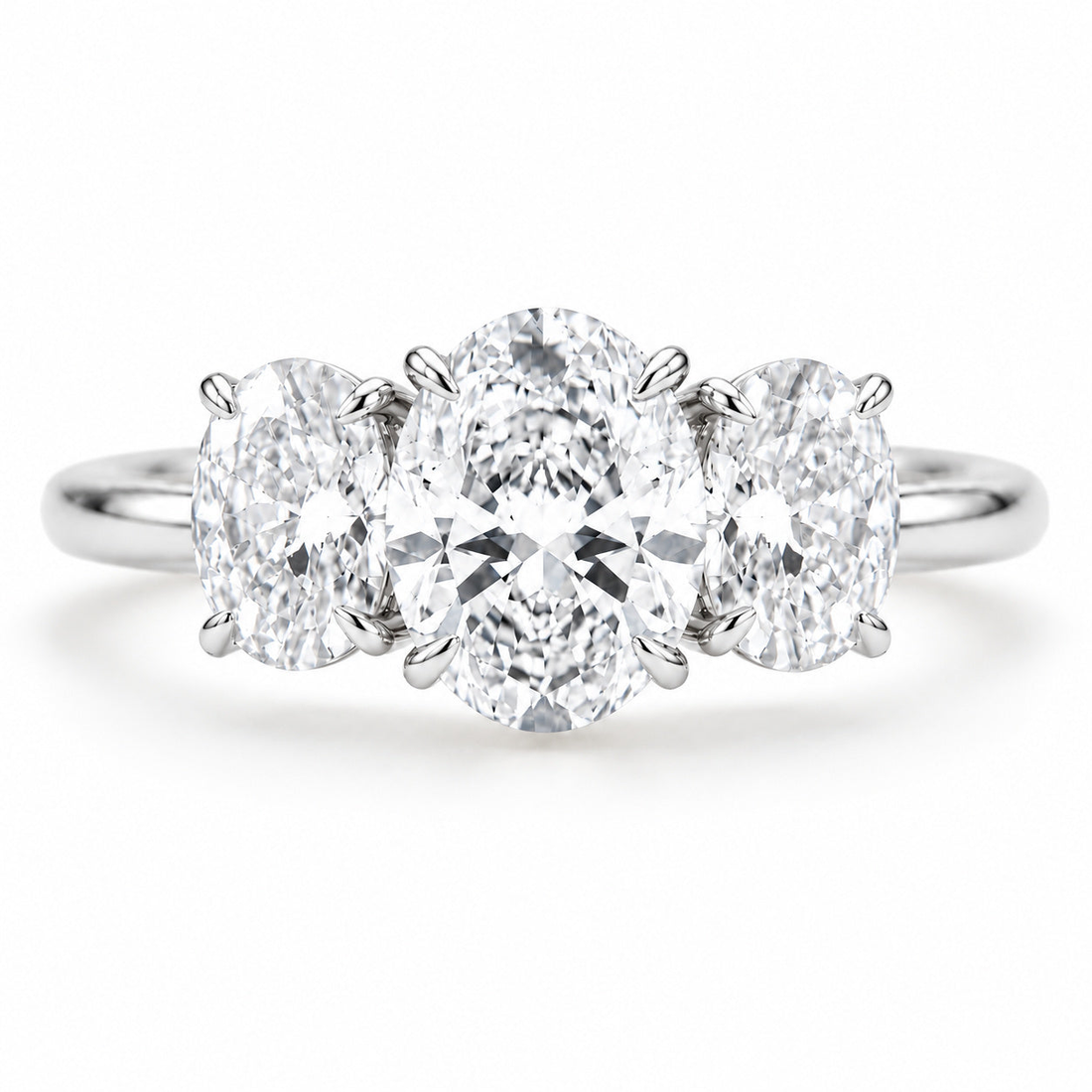 The Étoile oval lab diamond three-stone ring in platinum