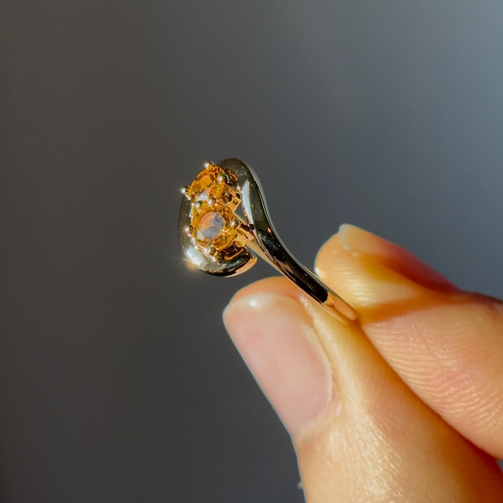 0.70ct "Stretch & Sword" Orange Sapphire Two-Stone Ring in Yellow Gold