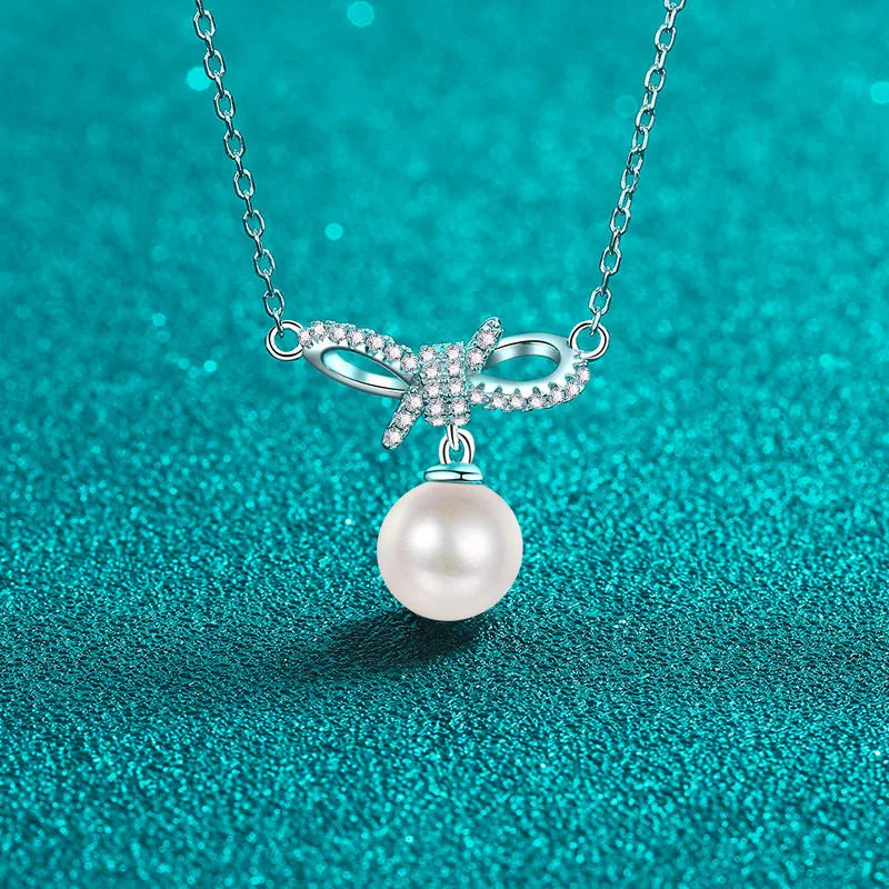 8mm Pearl and Moissanite Dangle Ribbon Pendant Necklace in Platinum Plated 925 Silver