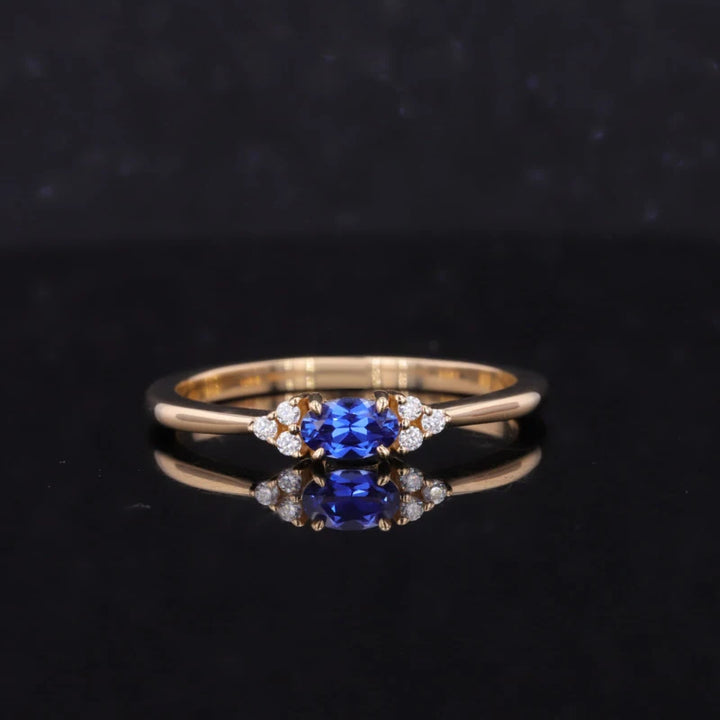 3x5mm, 0.3ct Oval Lab-Grown Blue Sapphire Ring with Diamond Accents in 14K Yellow Gold