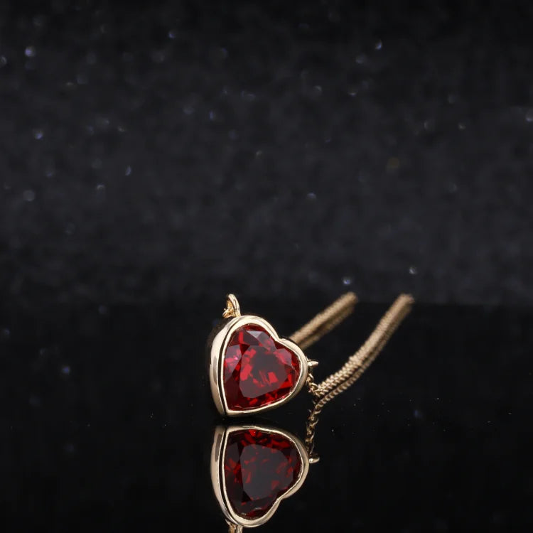 8mm, 2.50ct Bezel Set Heart Lab-Grown Ruby Pendant Necklace in 18K Yellow Gold